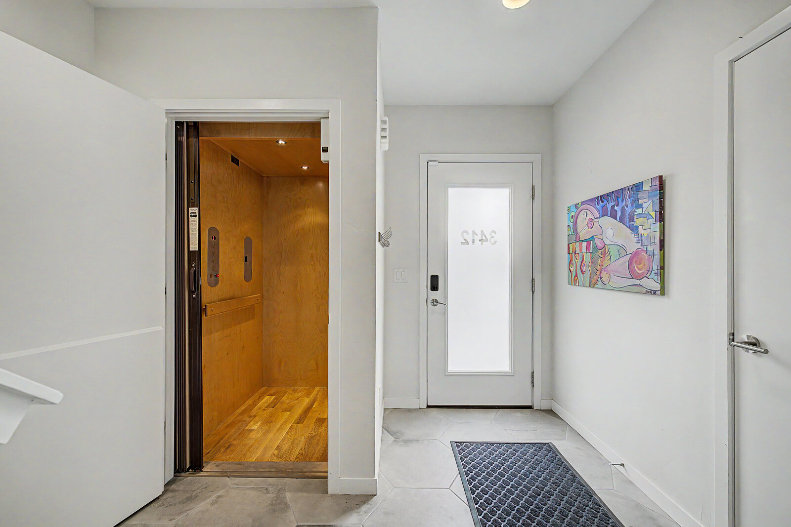 Private wood-lined elevator inside the townhome